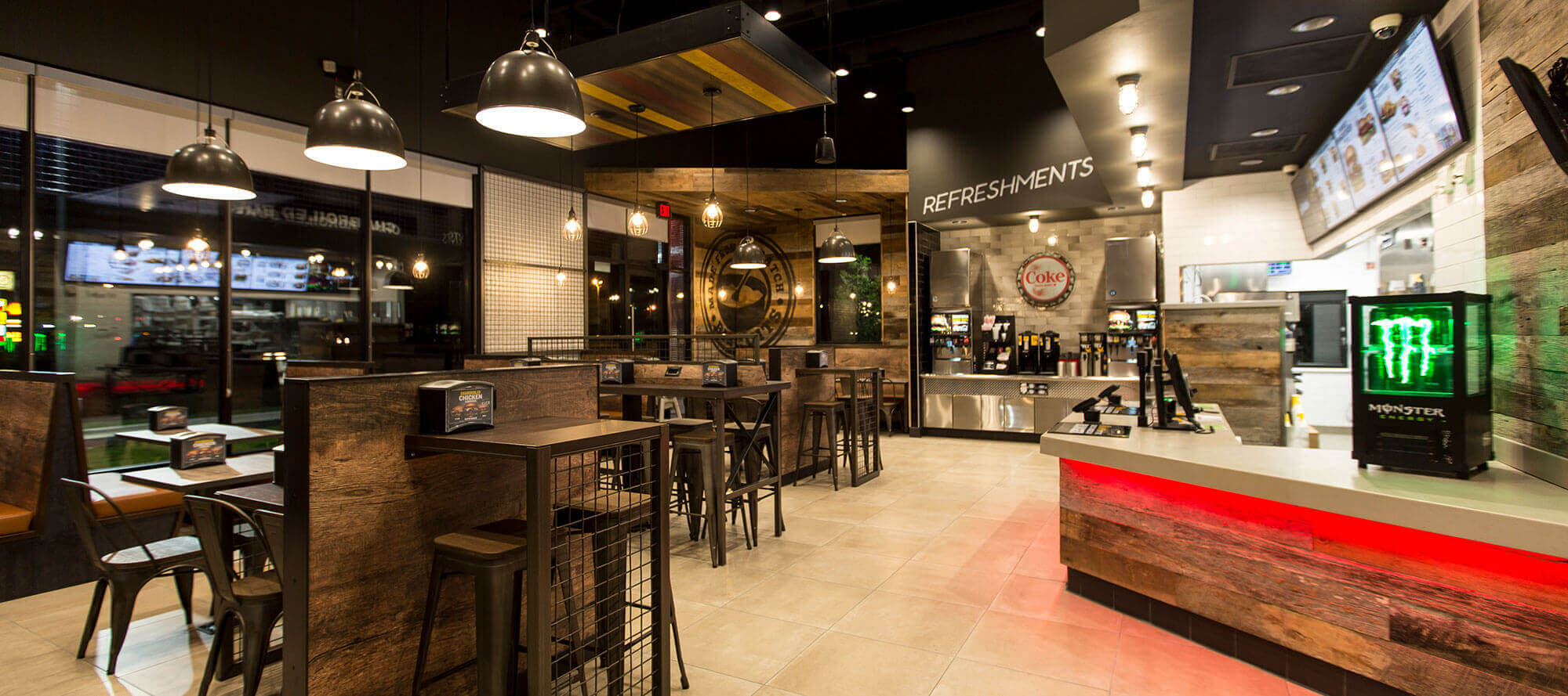 Hardee's worker assembling burger
